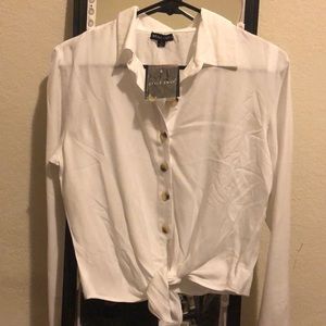 Front tie button to top